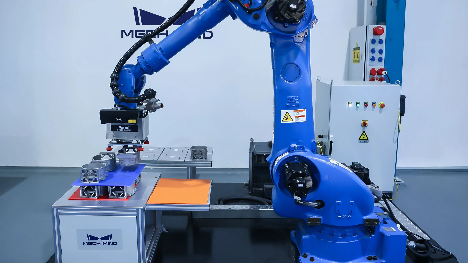 AI + 3D Vision-Guided Machine Tending of Motor Housings