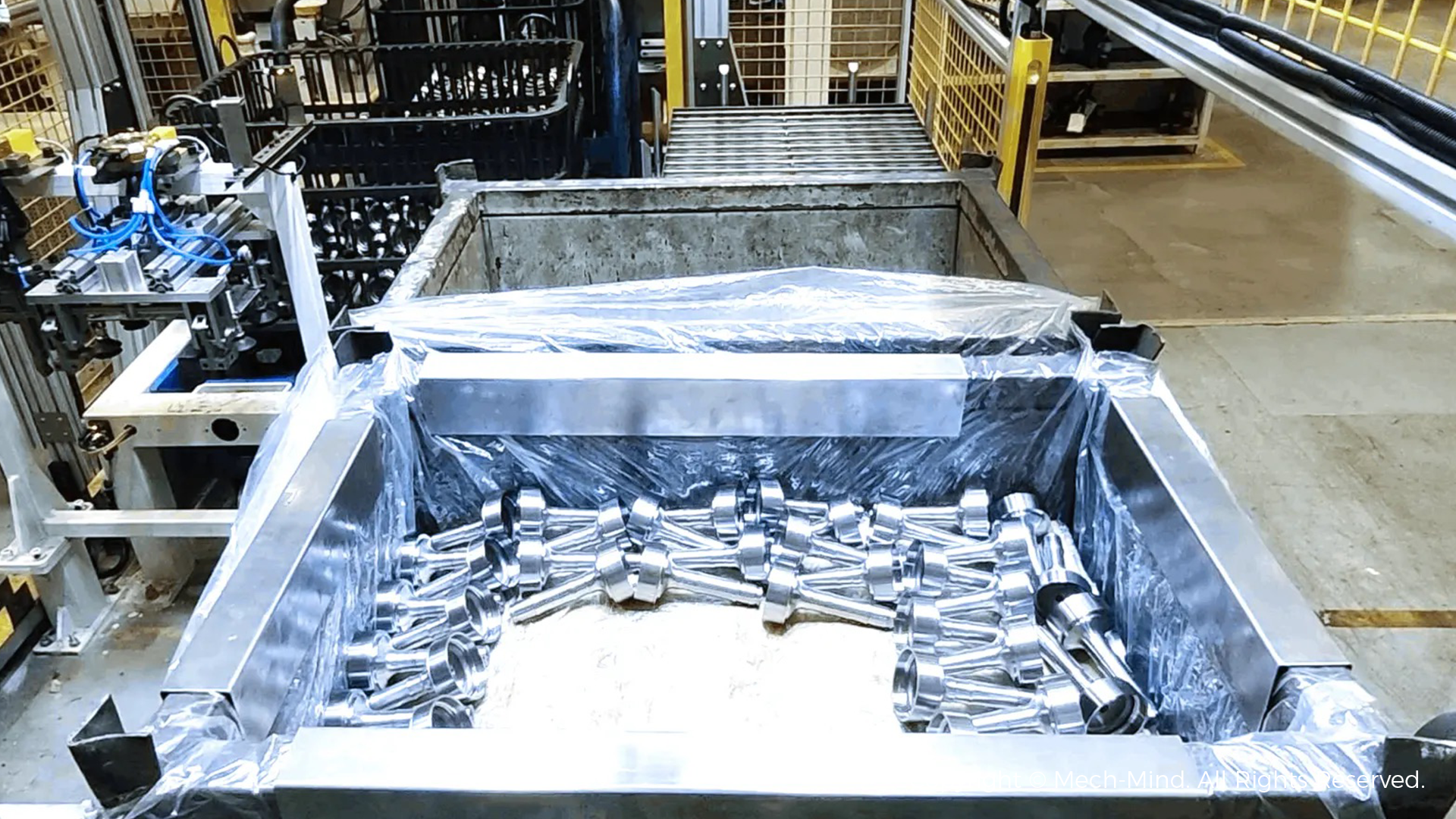 From Challenge to Reliability: Handling Reflective Parts with Mech-Mind “Eye + Brain”