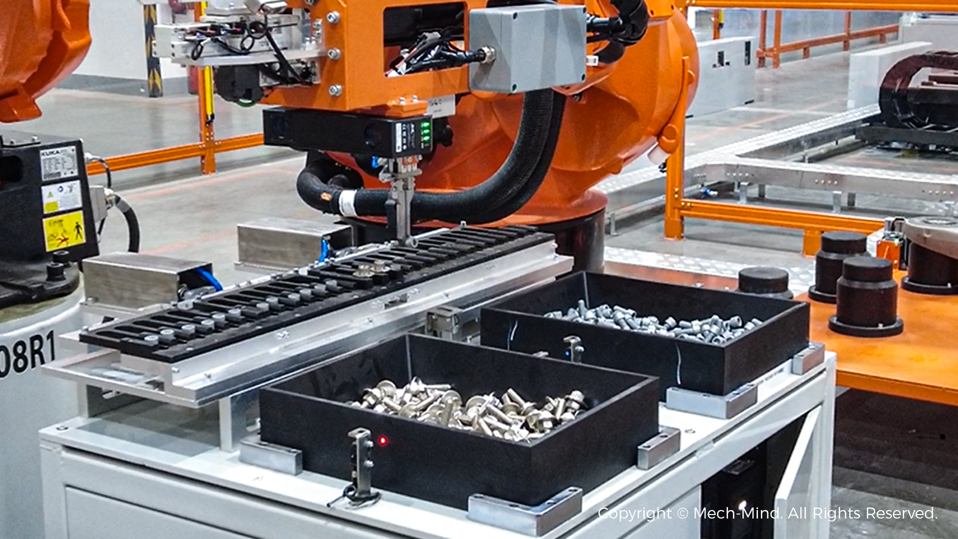 From Challenge to Reliability: Handling Reflective Parts with Mech-Mind “Eye + Brain”